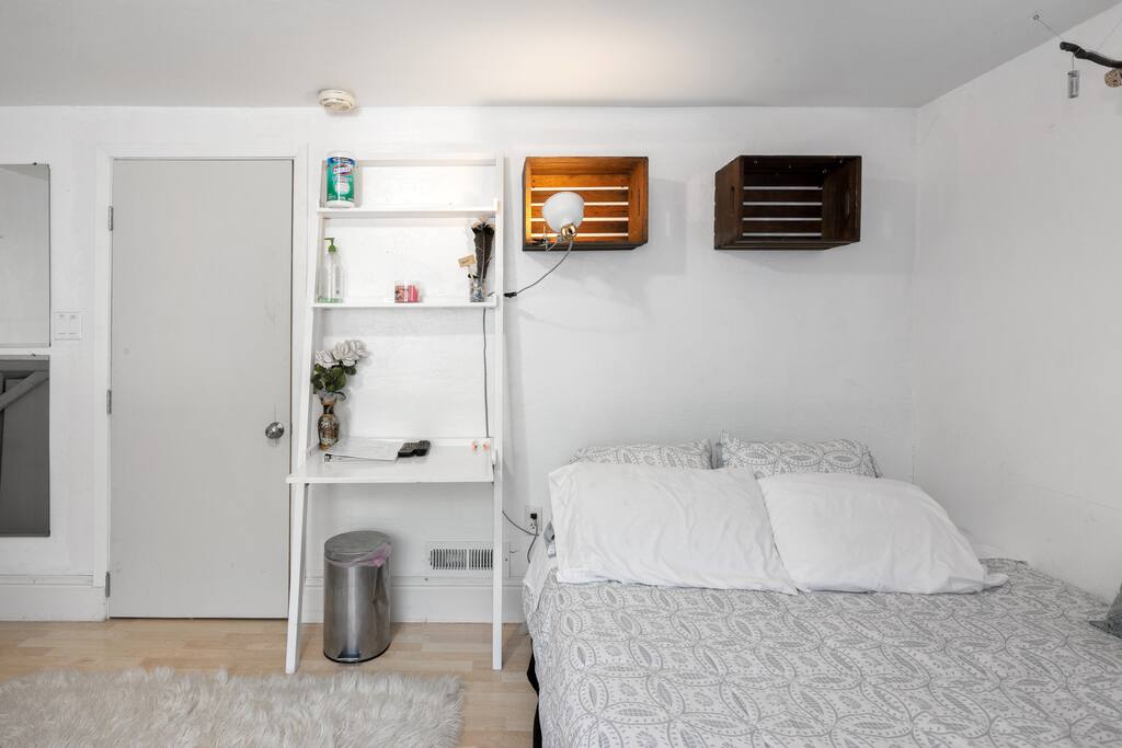 The bed and desk.