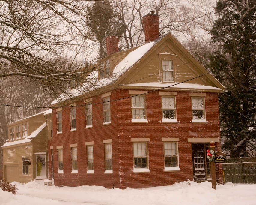 The apartment is in the rear unit of an historic two-family home