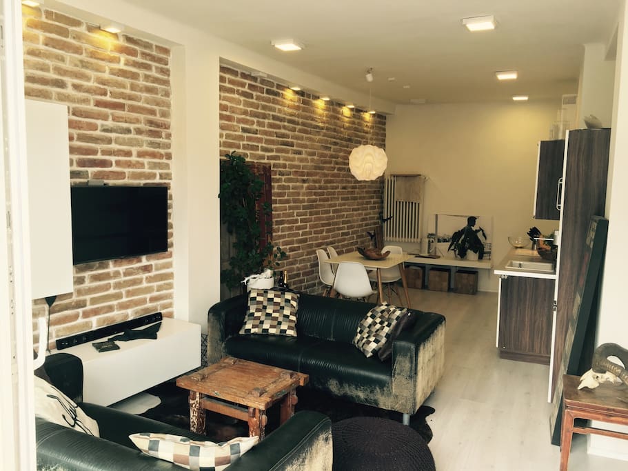 Common living room , kitchen and dining area.