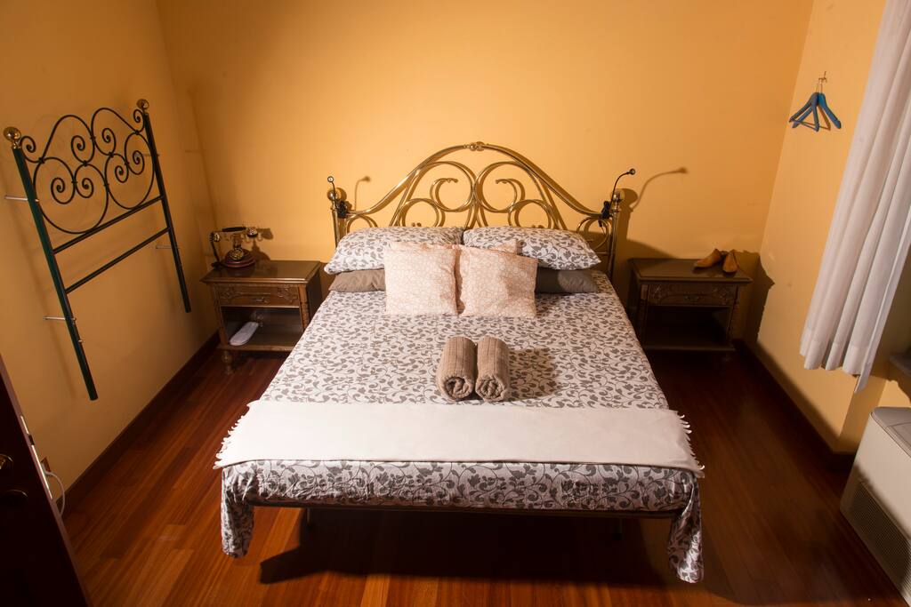 Your vintage Italian style big double bedroom with a great view