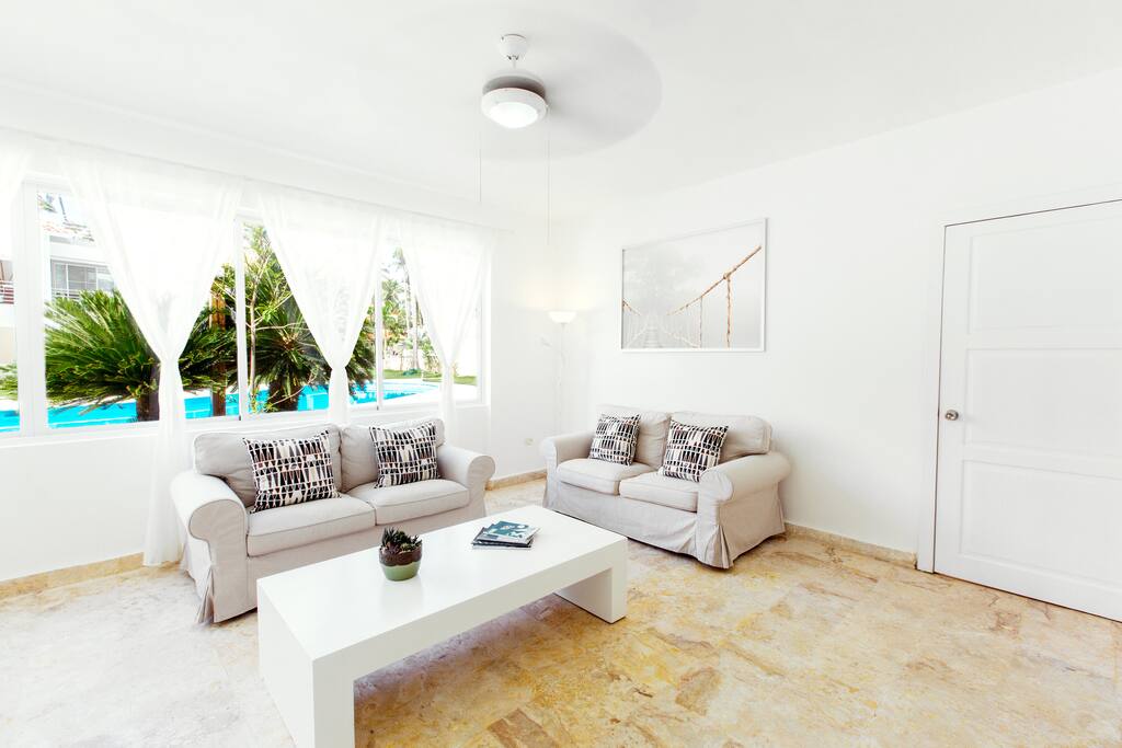 Living room with pool view