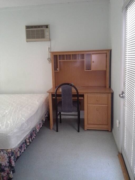 Computer desk; 4 cuft ref/freezer; Air conditioner or radiator space heater. .