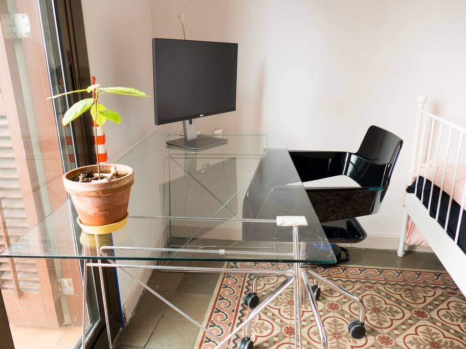 Large display with HDMI connection included in the room. For connecting your own computer.