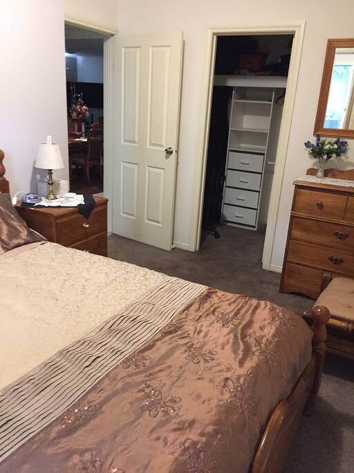 Queen size bed with walk in robe