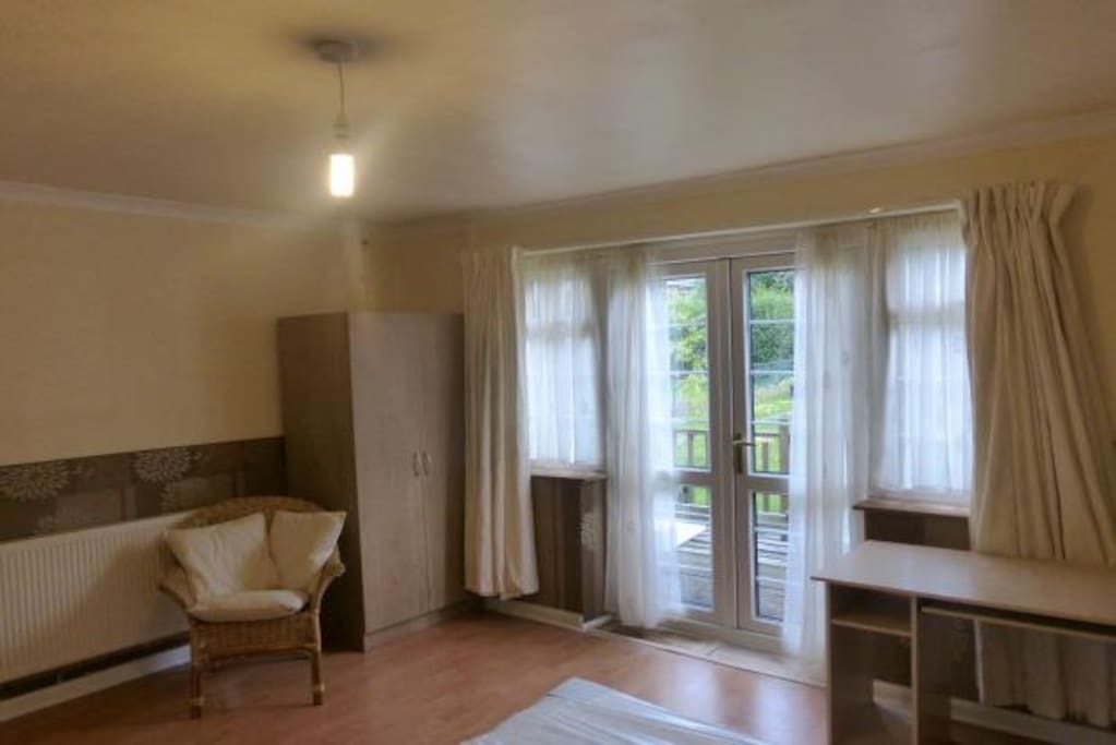 Large cosy room with separate access to the garden