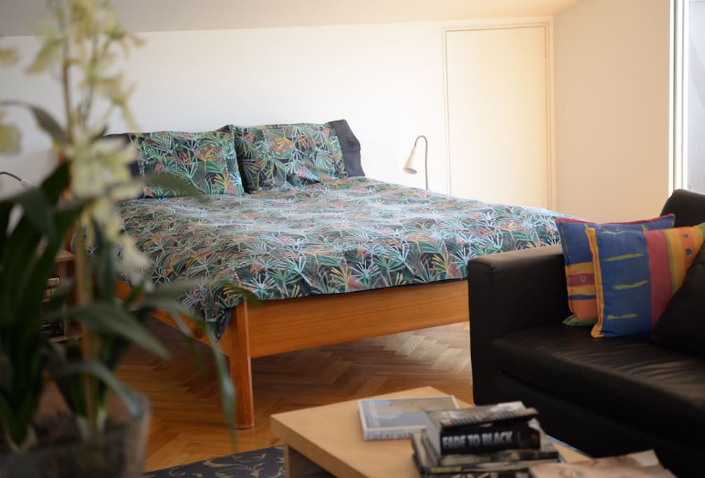 A comfy queen size bed.