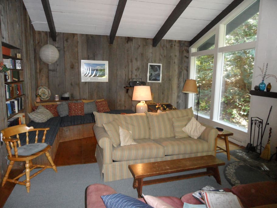 Spacious family room with extra reading nook in the corner and a pullout couch for extra sleep space