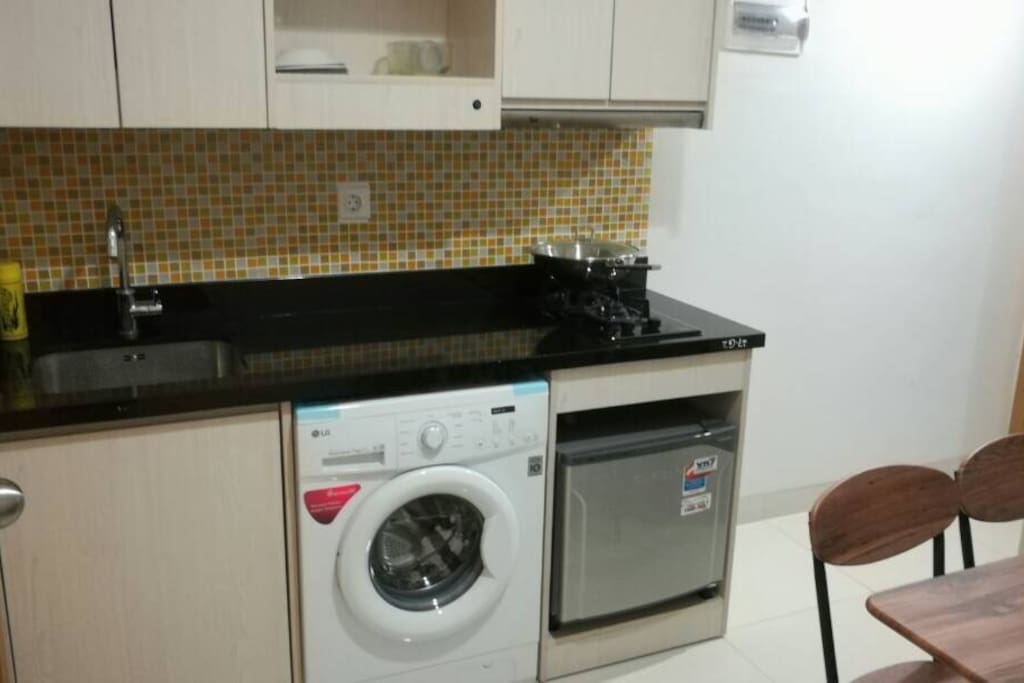 Kitchen with Washing Machine and Refrigerator