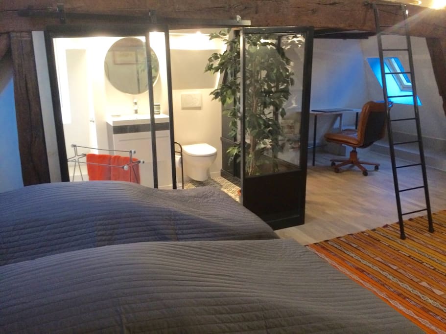 Loft space upstairs with two twin beds