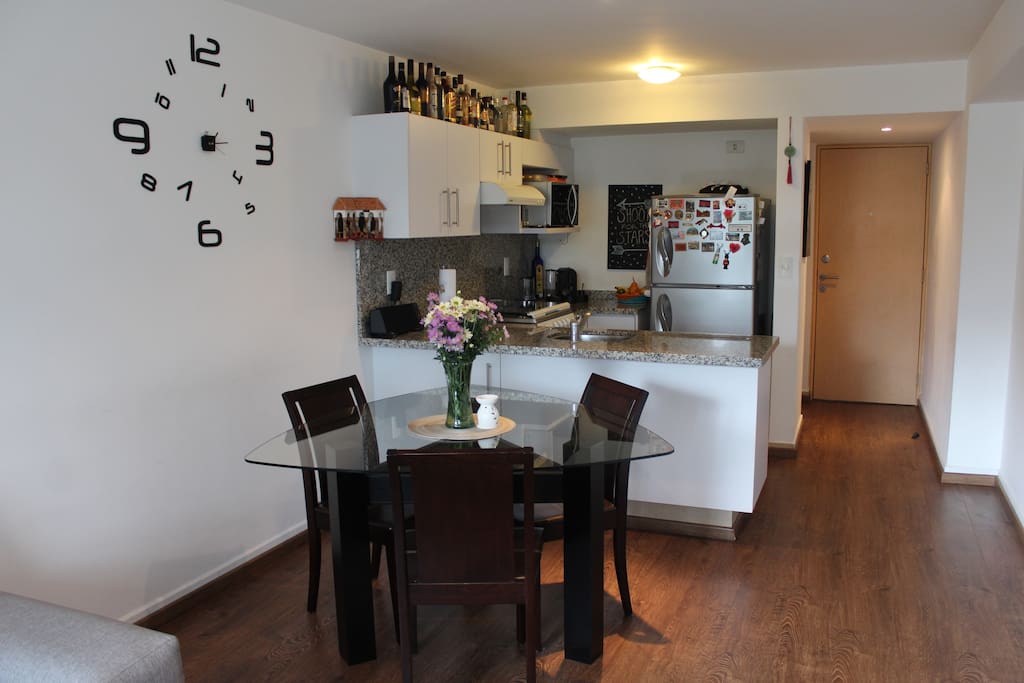 Dinning table and kitchen.