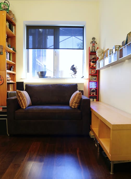 Sofa bed folds up easily for comfortable lounging or work.