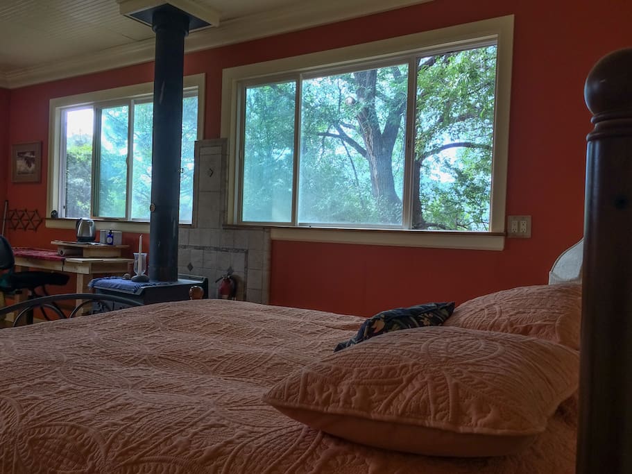 comfortable queen bed with a view