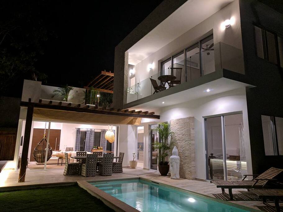 Villa 1 lit up at night