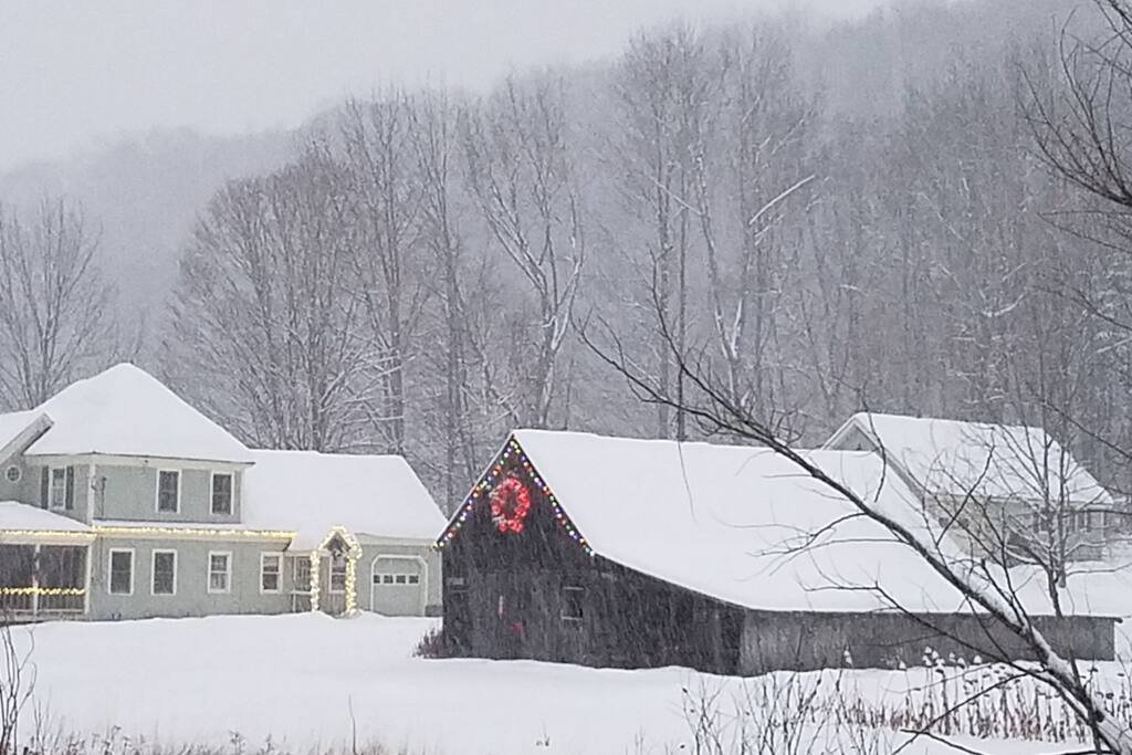 Little Bird Farm during holiday season. Cottage to the back right, behind barn in photo.