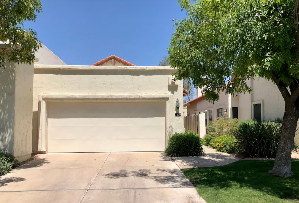 Front of home with garage access.