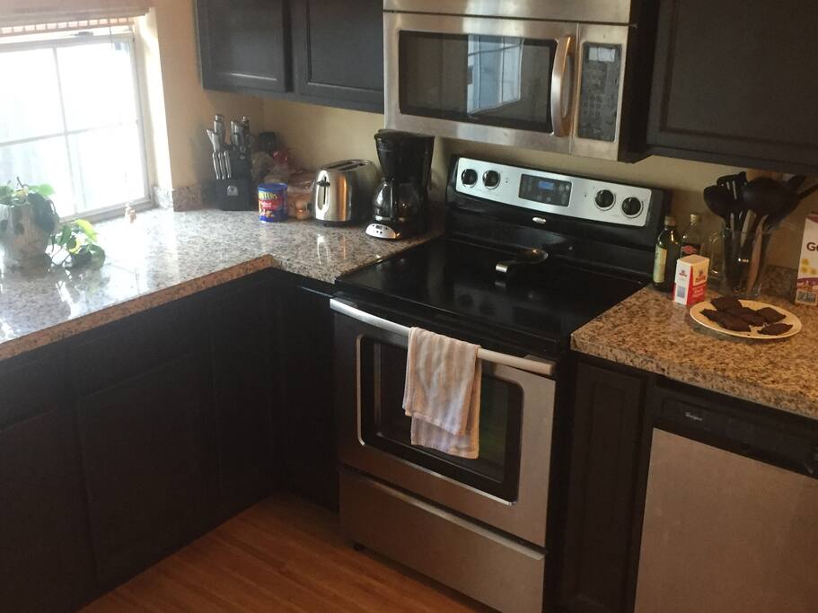kitchen with door to smoking patio in back