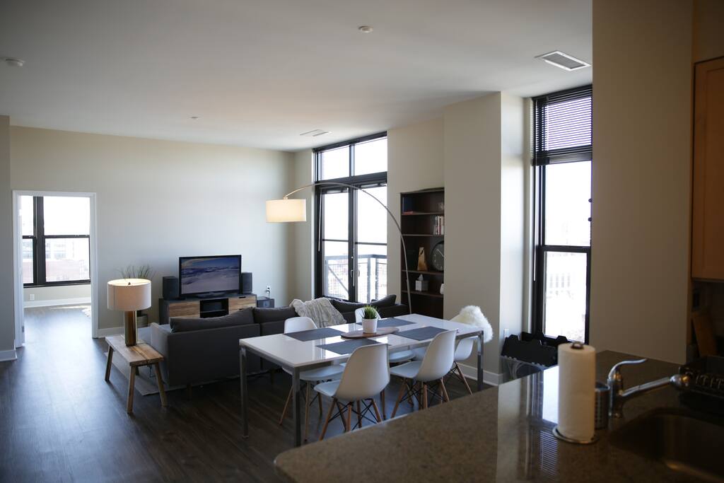 Beautiful open kitchen with spacious dining and living area.