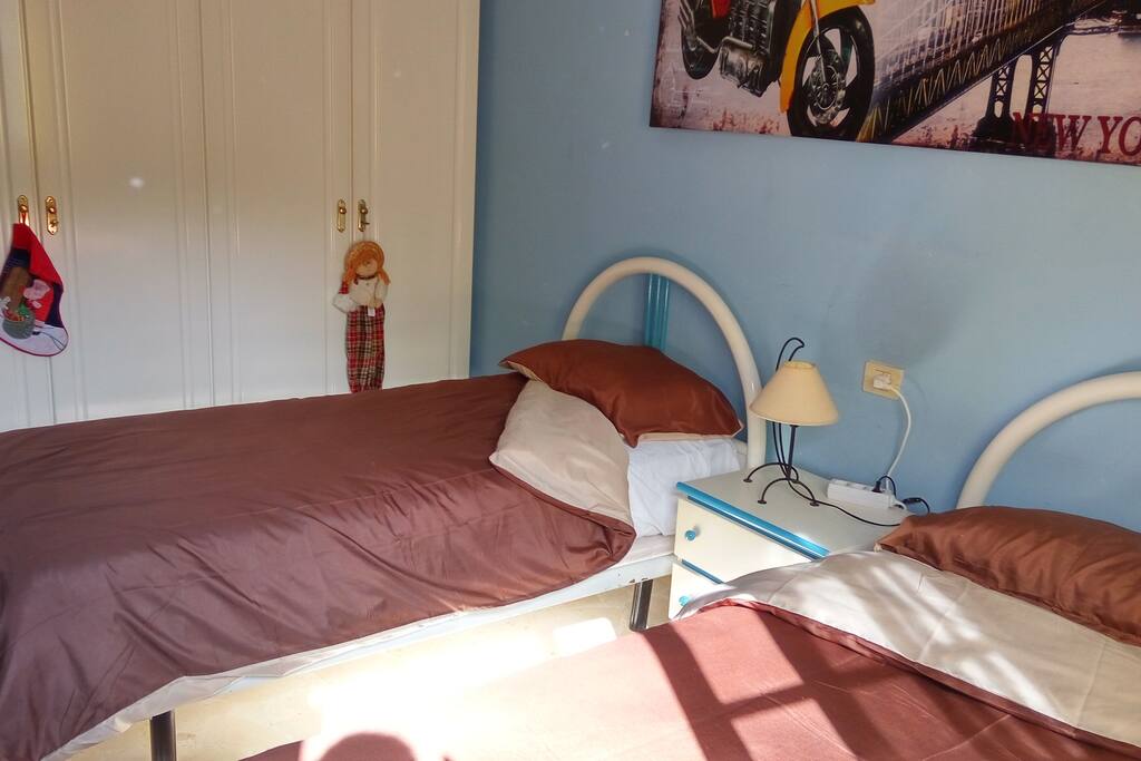 Bedroom with two single beds