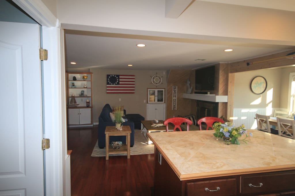 View of living room and dining room from kitchen
