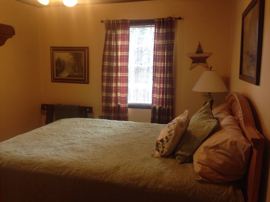 Bedroom 1 - Cozy and comfy queen size bed, dresser and closet for extra items.