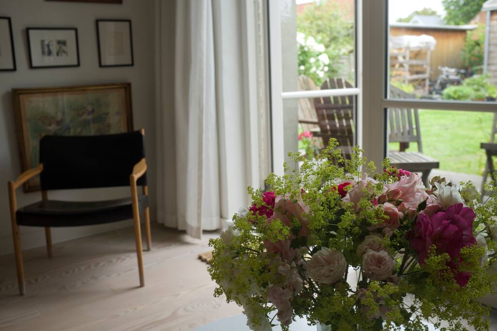 Living room opens up to beautiful garden.