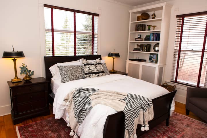 The main floor offers a stunning queen bedroom with memory foam mattress, luxury bedding and french doors.  A spa-like full bathroom is just around the corner and offers fluffy towels and a set of toiletries.  