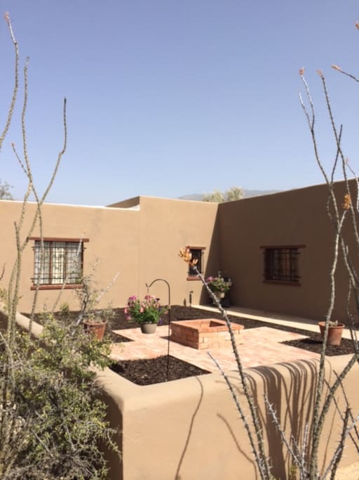 Back courtyard with fire pit and patio