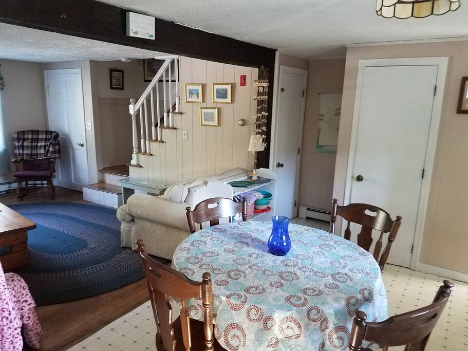 Open kitchen/living room off of three season room. Second kitchen and living rooms not pictured.