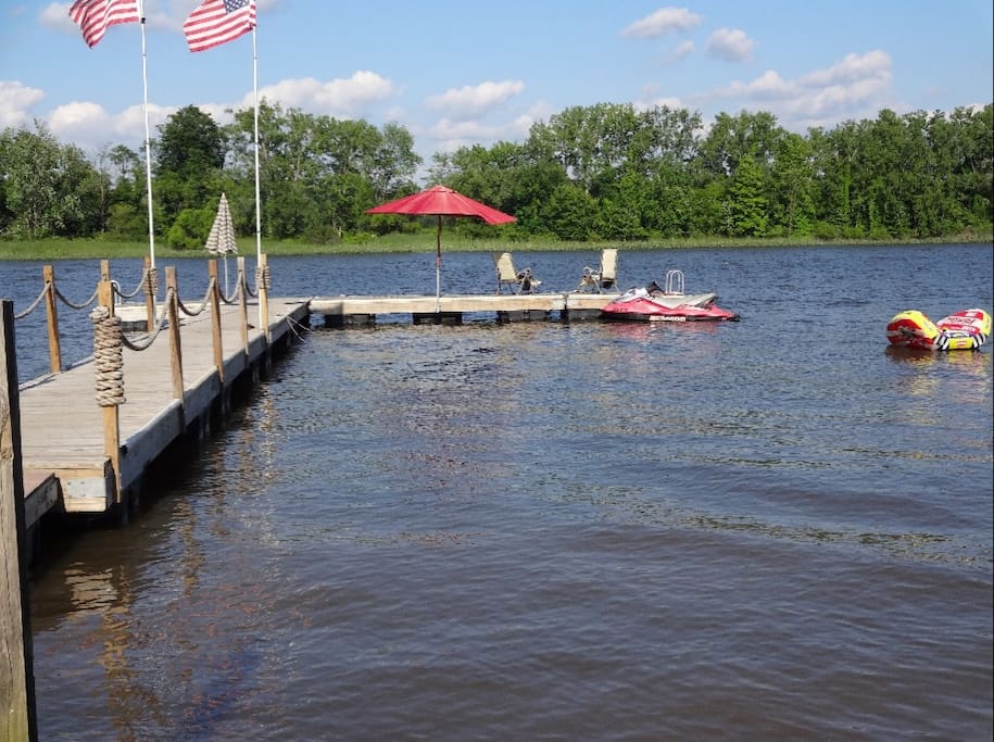 Private dock and sandy beach. Bring your boat or jet ski