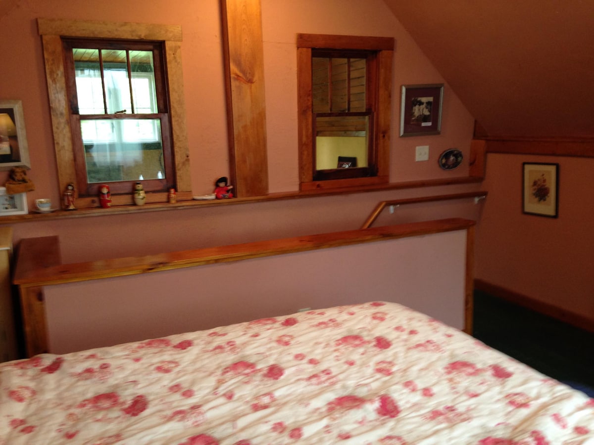 Loft bedroom with queen bed