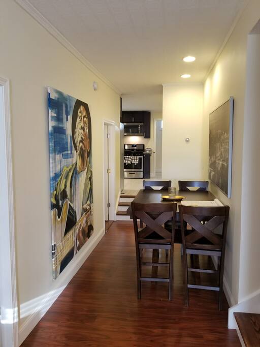 Hallway to your room, the kitchen, and the bathrooms