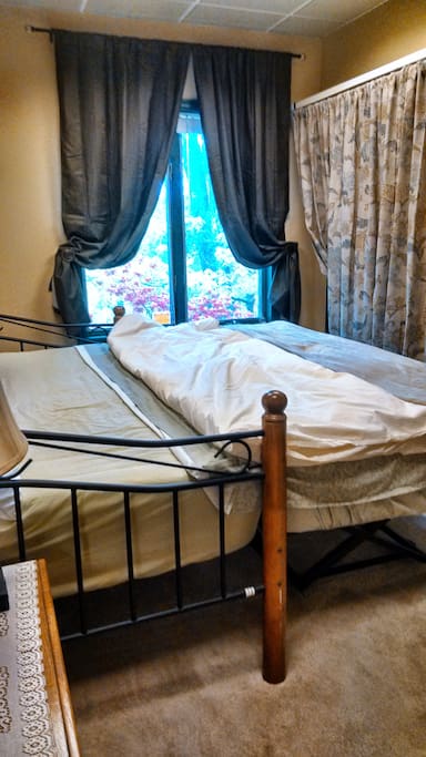 the bedroom-two twin beds that opens up into a king size bed with real mattress