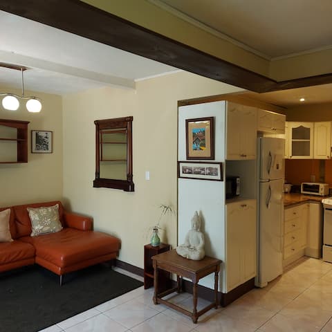 Centrally located with a bathtub and parking