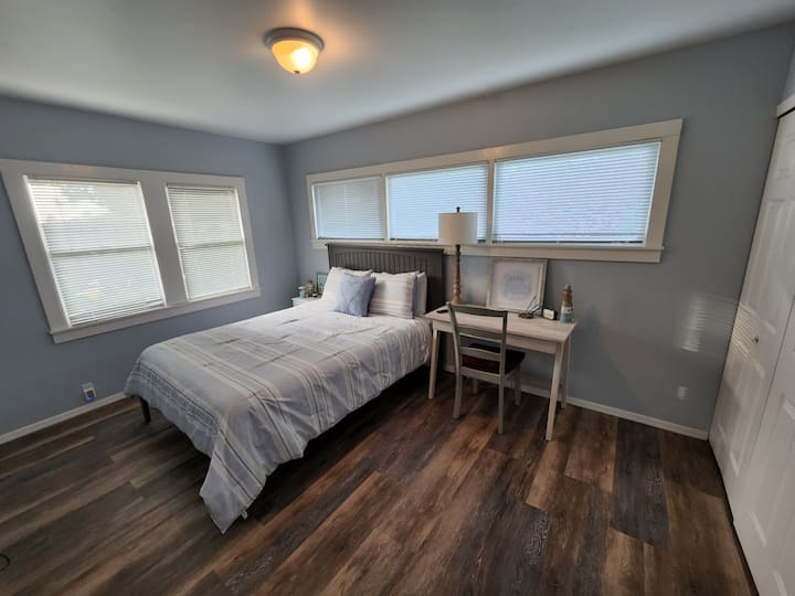 Bedroom with queen bed.