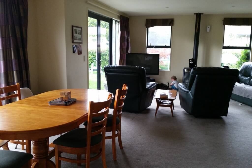 Large main lounge, kitchen, dining room. Large outdoor table and chairs (seats over 10) outside on the sheltered patio. Large second lounge/toyroom/office space adjoins.