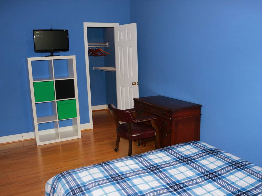 Walk-in Closet, Desk and Shelving.