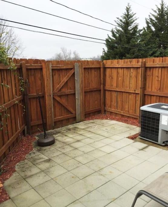 Fenced in back patio to chill