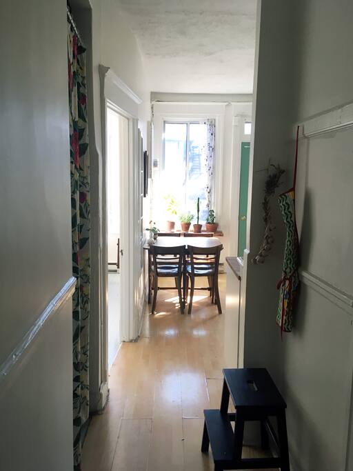 View from entrance to the kitchen (with the door to the bedroom to the left)