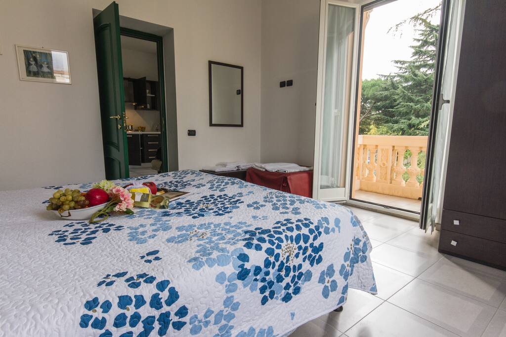 Comfortable and bright bedroom with access to the balcony