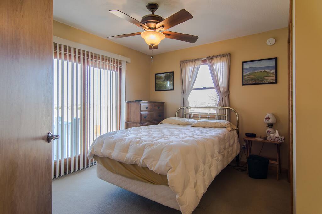 Comfortable bed with remote that lifts head/feet along with vibrating motion. Sliding glass door to back yard.