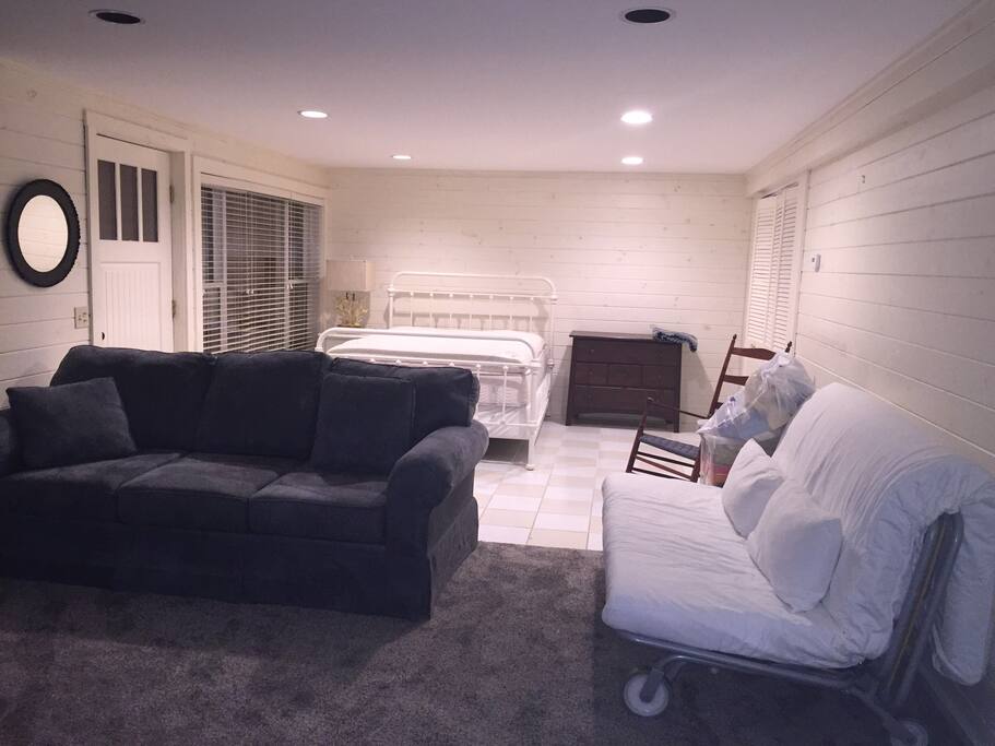 Very large bedroom with river view. Queen size bed. Very large closet. Checkerboard tile floor.