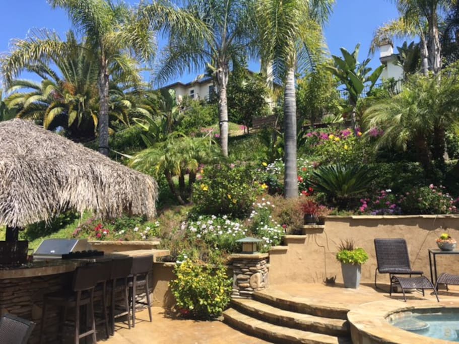 Sit at the bar while the family plays in the pool