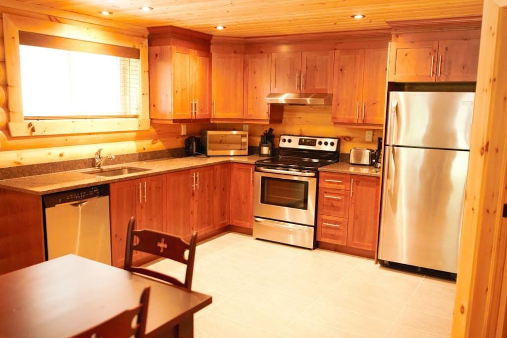 Cook meals in the privacy of your own suite with the modern fully-equipped kitchen.