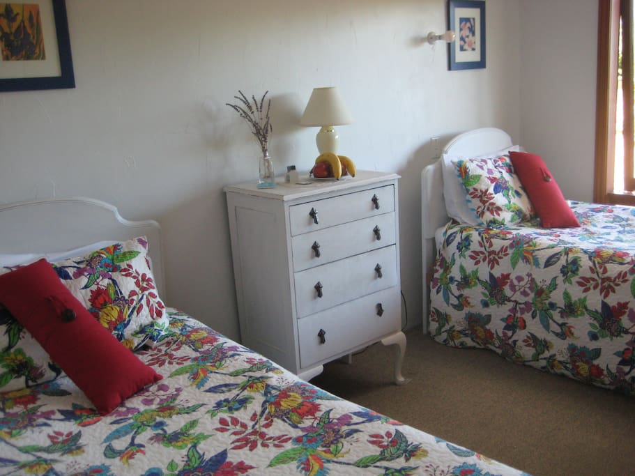 The twin room with shared bathroom