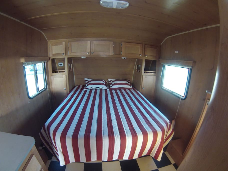 Queens size bed for two with great lighting and air.