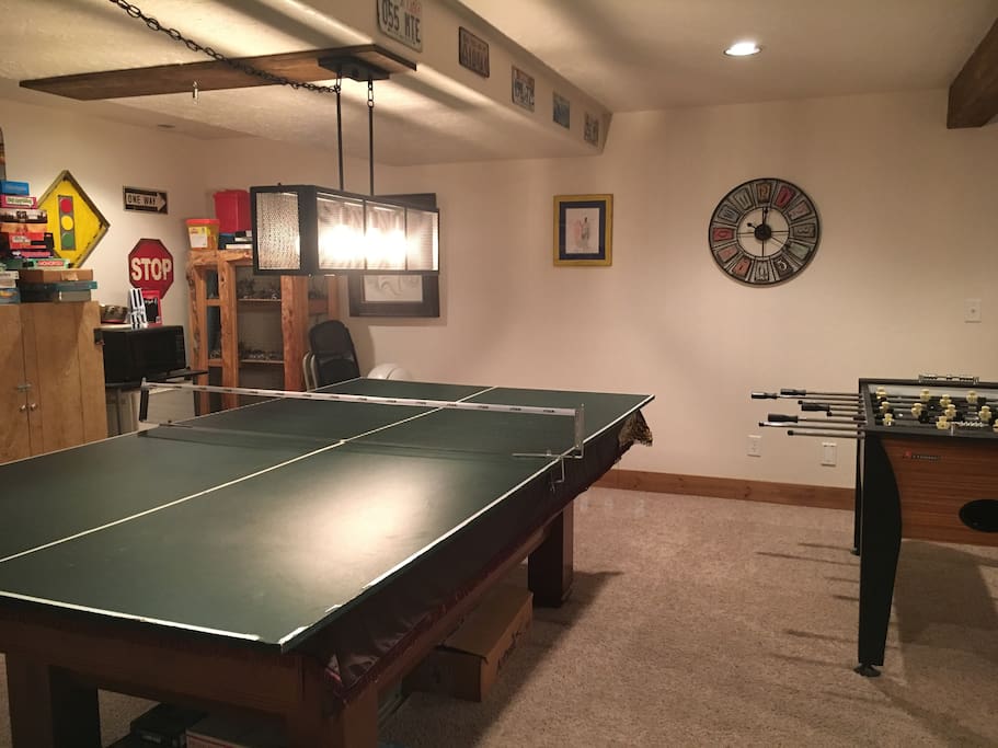 Ping pong/pool table with fooseball.