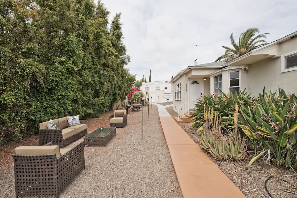 Huge private outdoor area - 3 seating areas for relaxing - bbq - fire- pit, tiki torches for nightime vibe - see later pictures for more