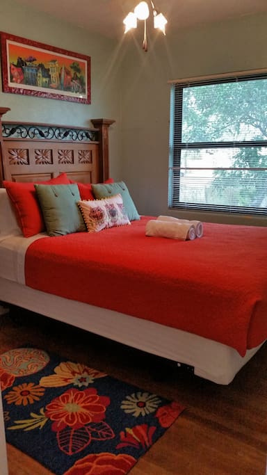 Room 2- Queen Size Pillow top bed. Very comfortable. Also lots of light from a large window with a ceiling fan and light.