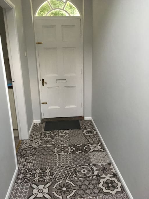 Back door and hallway; the entranceway for the guest bedroom.