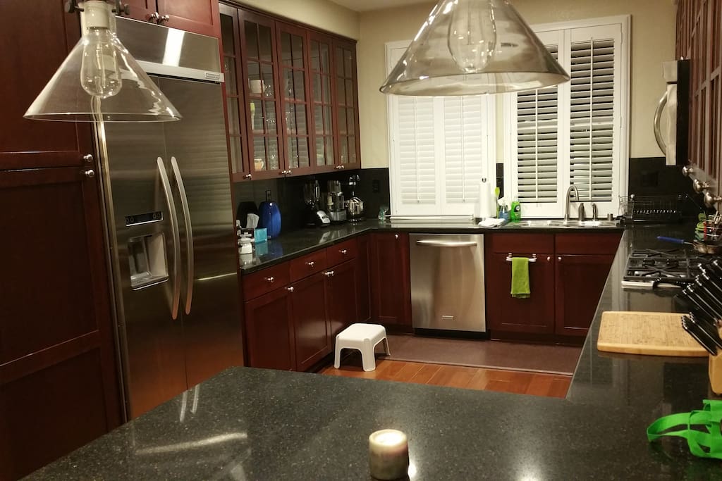 High-end stainless steel appliances, granite counters